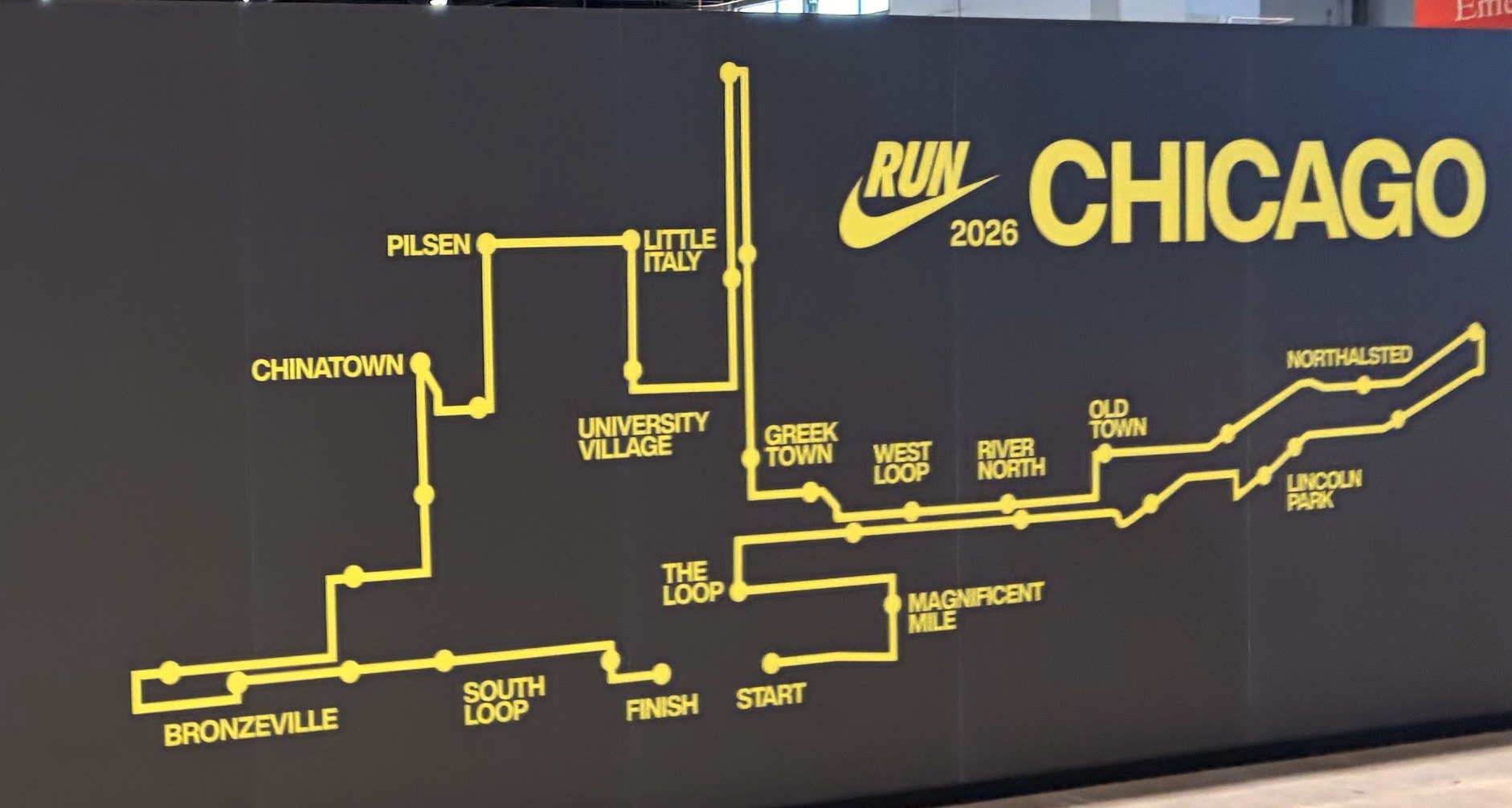 The 2026 Chicago Marathon course map wall, showing the route through each neighborhood from start to finish.