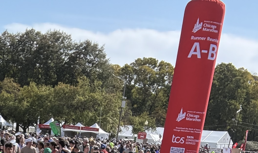 Runner Reunite A-B inflatable pillar at the Chicago Marathon finish area in Grant Park.