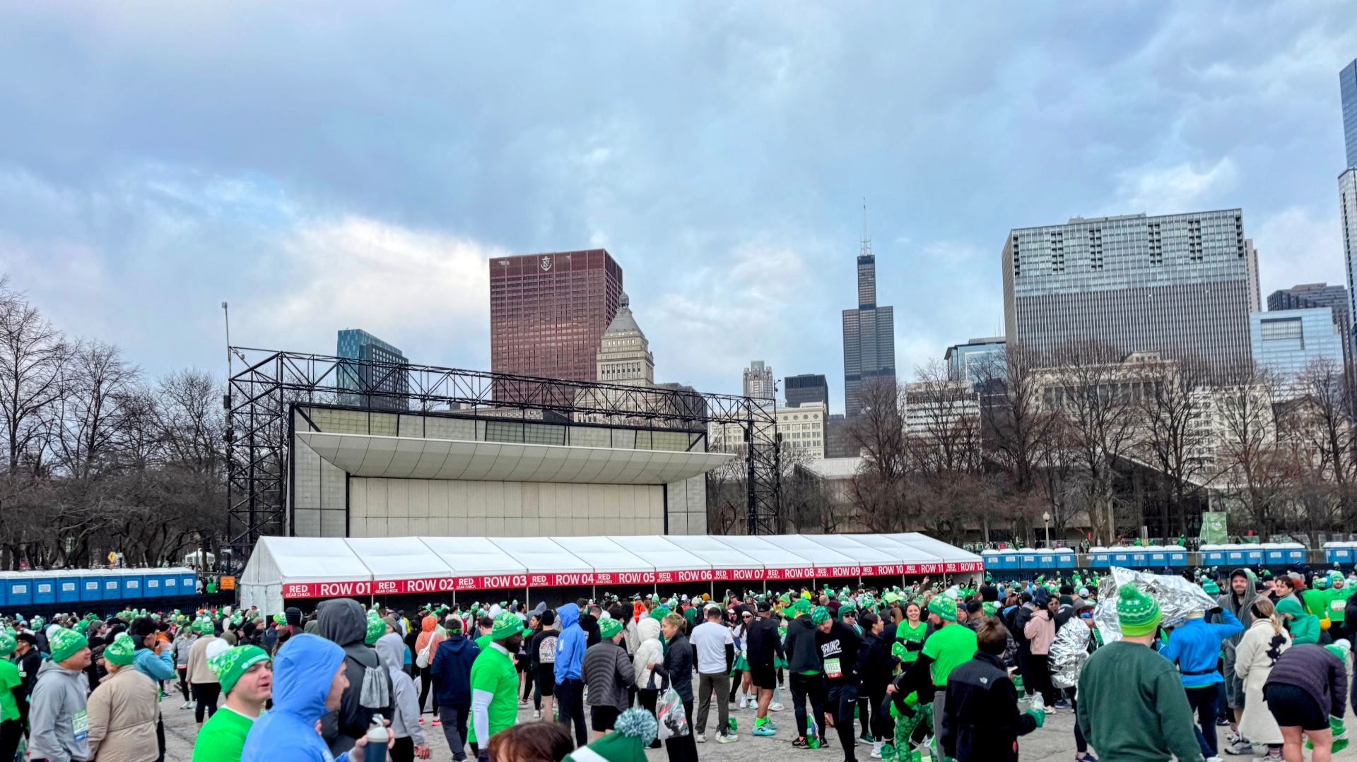 Red Gear Check tent rows with Sears Tower skyline in background