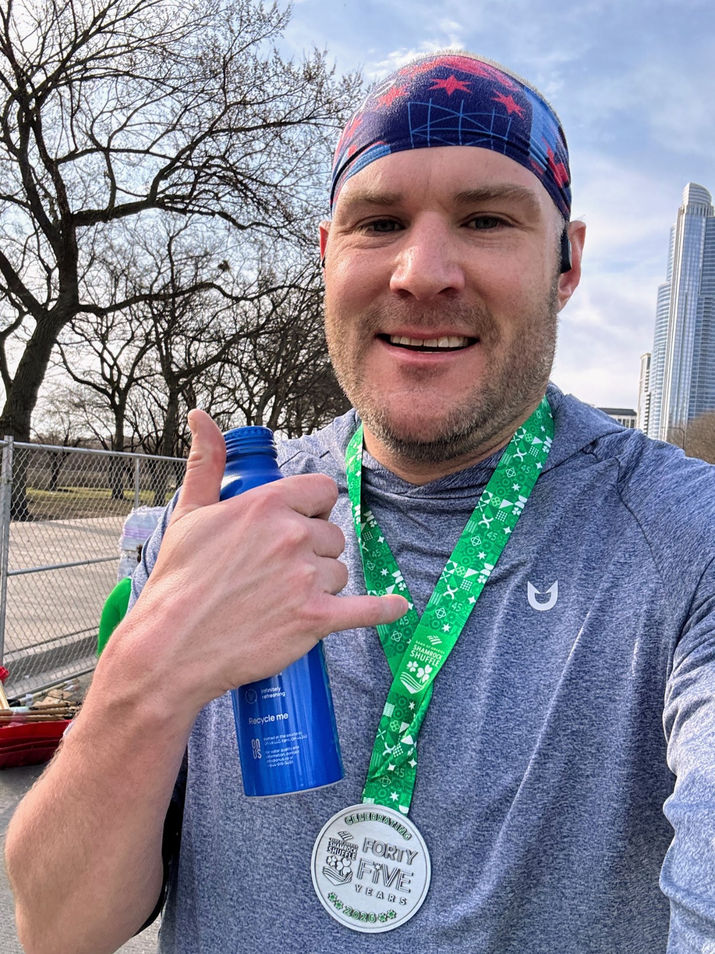 Post-race selfie with 45th annual Shamrock Shuffle finisher medal
